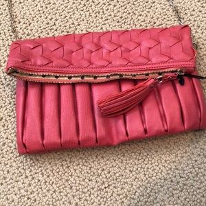 Urban expressions coral clutch with link straps